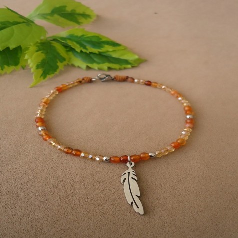 PULSERA CON DIJE PLUMA