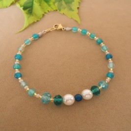 PULSERA EN HILO AZUL TEJIDO CON NUDOS