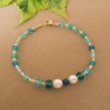 PULSERA EN AGATAS AZUL  Y PERLAS