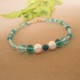 PULSERA EN HILO AZUL TEJIDO CON NUDOS
