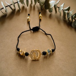 PULSERA  EN HILO NEGRO ORO GOLFILLED Y CIRCONES