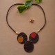 COLLAR  EN CUERO CAFE  DIJES REDONDOS